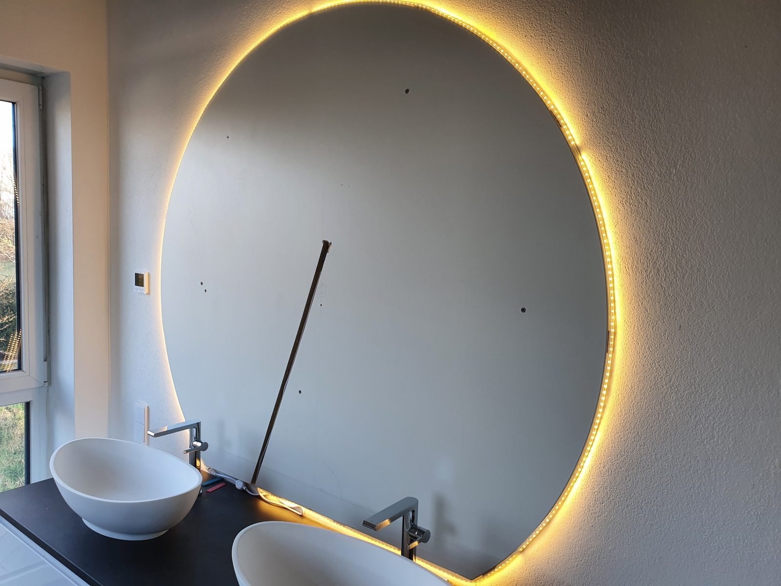 Runder Spiegel mit LED-Beleuchtung